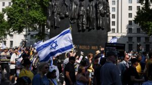 Iranian dissident journalist choked in assault at London march for release of hostages
