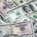 Dollar Climbs with Bond Yields