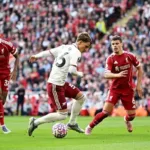 Superb freekick helps Liverpool beat Arsenal in top-of-table clash