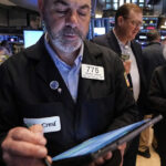 World equities hit record highs, US yields fall on optimism for Fed rate cut