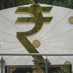 Rupee falls 18 paise to close at 87.25 against U.S. dollar