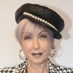 Cyndi Lauper, 72, rocks spiky blue hair and funky polka-dot suit at NYFW event with Martha Stewart