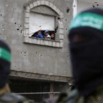 Hamas starts gathering hostage remains, denies agreeing to gradually disarm