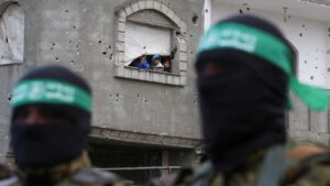 Hamas starts gathering hostage remains, denies agreeing to gradually disarm