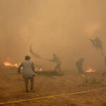 Spain continues to battle destructive wildfires even as heatwave eases