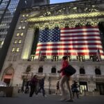 Wall Street climbs to new highs on hopes of interest rate cuts
