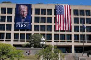 Trump Pulls From Dictator Playbook and Hangs Giant Banner of His Face