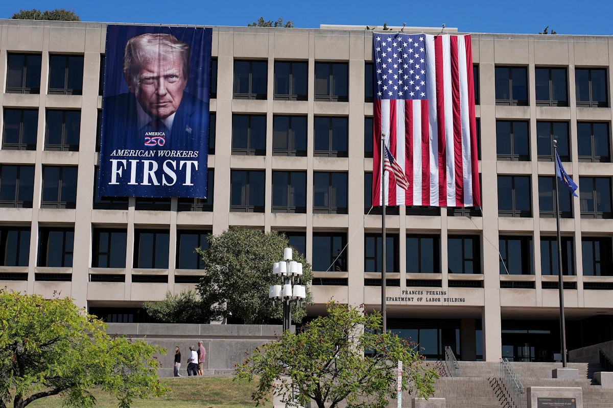 Trump Pulls From Dictator Playbook and Hangs Giant Banner of His Face