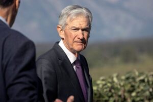 Markets close on a high as Powell hints at September rate cuts
