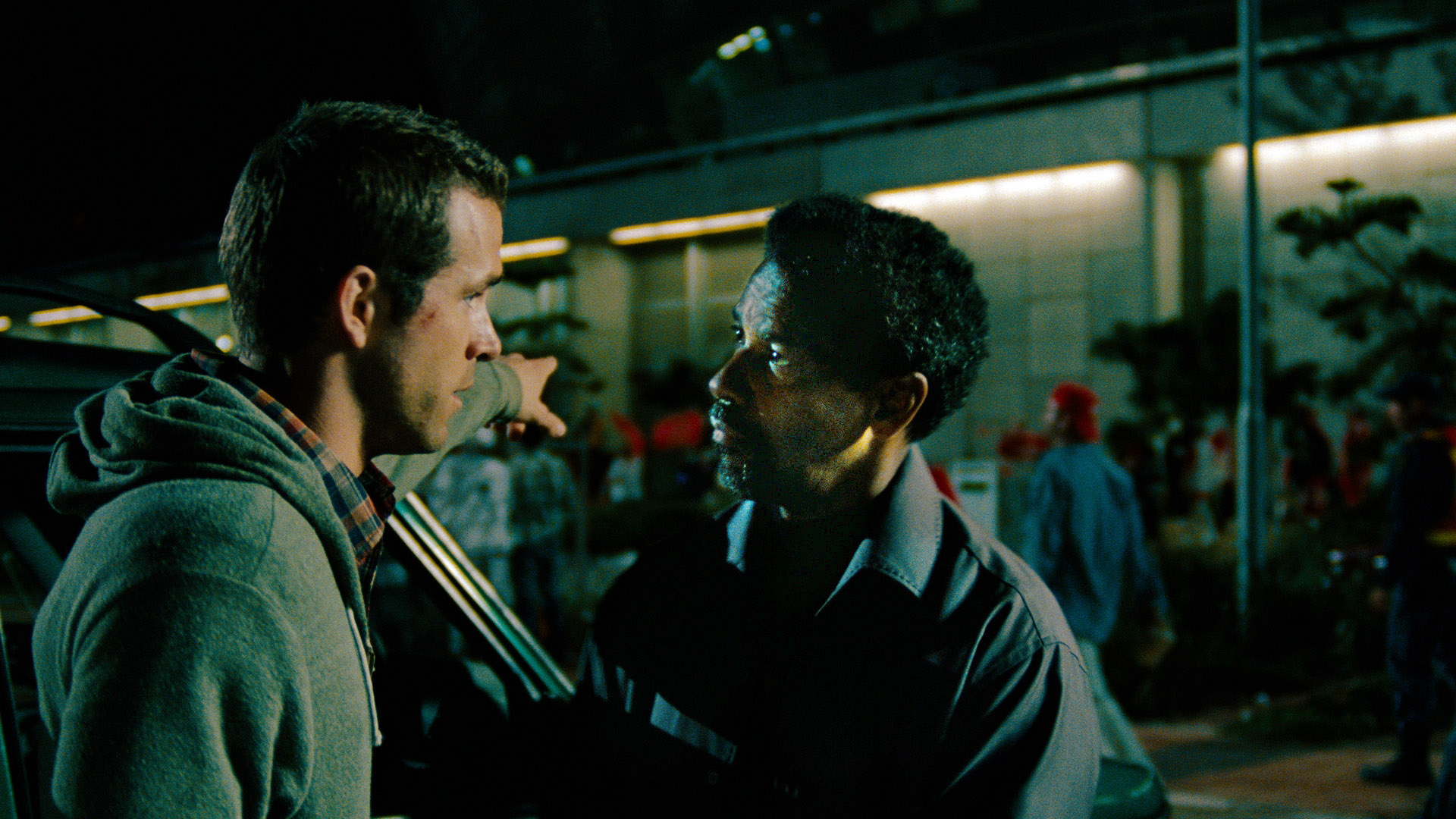 Ryan Reynolds Enraged Denzel Washington When His Phone Rang During Emotional ‘Safe House’ Scene: ‘Who the F—‘s Phone Is That?’