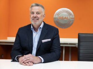 REAL CEO says finances ‘trending in a positive direction’