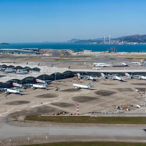 Two killed as cargo plane skids off Hong Kong runway into sea