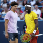 Frances Tiafoe reacts to Ben Shelton’s injury retirement at the US Open