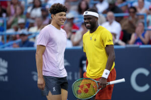 Frances Tiafoe reacts to Ben Shelton’s injury retirement at the US Open