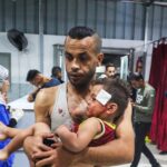 Israel says Gaza ceasefire back on after more than 100 reported killed in strikes