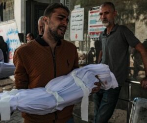 Gaza: Israeli strikes kill at least 100, including dozens of children