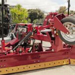 SharpGrade grader blade for large-frame SSLs and CTLs now features hydraulic retracting front wheel assembly