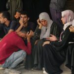 Israel fires on family crossing cease-fire line in bus, killing 11