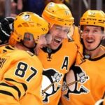 Penguins win entertaining opener over Islanders; Malkin rolling