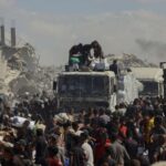 Israel Says It’s Halving Aid Into Gaza After Receiving Last 20 Living Captives