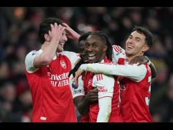 Too Eze!  -trick helps Arsenal beat Spurs and take six-point lead in EPL