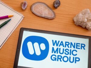 Warner Joins Forces With AI Song Generator, Suno, That It Was Suing