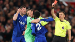 Gueye sent off for striking team-mate