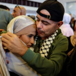 Israel celebrates releases, warns Palestinians over reunion scenes
