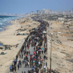 Palestinians in Gaza March North Again, Returning to Homes Turned to Rubble