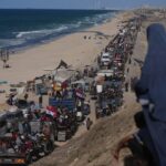 LIVE: Israel-Hamas truce holds, bulldozers clear rubble in Gaza City