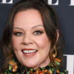 Melissa McCarthy looks sleek after weight loss in two sparkly outfits -through black ensemble