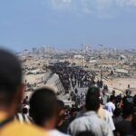 Tens of thousands of Palestinians return to devastated northern Gaza amid ceasefire