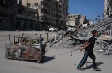 Palestinians return to devastated Gaza City as truce holds