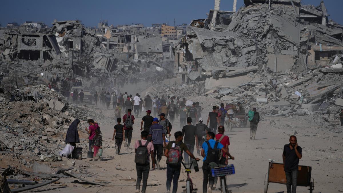 Thousands of Palestinians return to what’s left of their homes as Gaza ceasefire takes effect