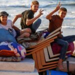 LIVE: Palestinians return to destroyed Gaza homes as Israel ceases fire