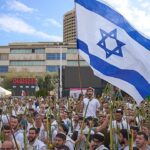 Tel Aviv gathers in prayer as Israel takes step toward Gaza truce