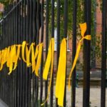 Woman hands herself into police after ribbons for Hamas hostages cut down