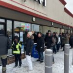 Customers line up at Manitoba Liquor Marts for 1st chance to buy American liquor in months