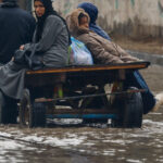 Rain has flooded Gaza tents and a baby died of exposure, medics say