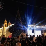 Bethlehem Christmas tree lights up for first time since start of Gaza war