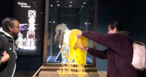 Protesters throw custard over U.K. Crown Jewels display case, closing the Tower of London