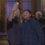 Glen Powell proves to ‘Mitch the UPS guy’ that he’s no liar after long wait to host ‘SNL’