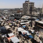 The tiring task of repairing Gaza’s tattered banknotes