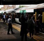 Surrey trains LIVE: London services disrupted between Clapham and Woking after ’emergency’