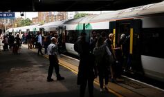 Surrey trains LIVE: London services disrupted between Clapham and Woking after ’emergency’