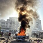 Israel launches strikes in Gaza ceasefire’s latest test as hospitals say more than 20 killed