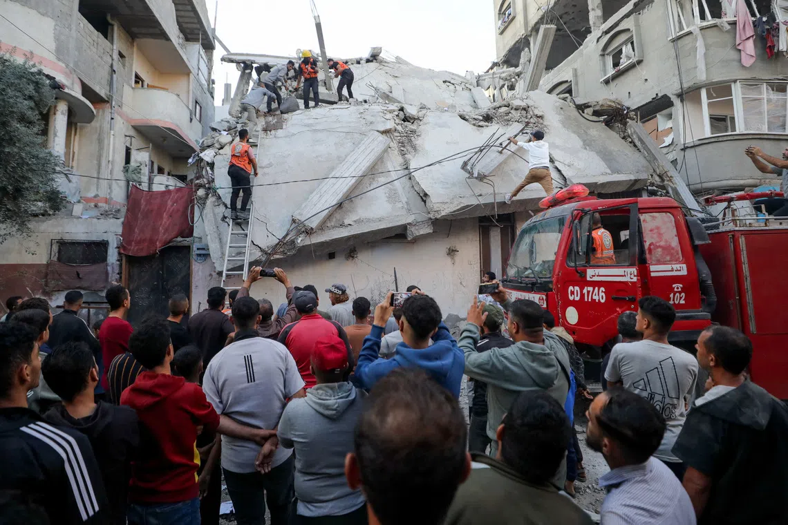 Israeli airstrikes kill at least 20 people in Gaza, medics say