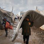 First strong winter rains soak Gaza’s makeshift shelters