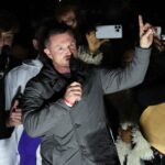 Hundreds join Tommy Robinson’s far-right rally in London: ‘Make Christmas Great Again’