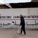 Gaza aid groups continue work amid Israel’s ban